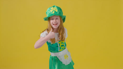 Mid-Shot-of-a-Little-Girl-Skipping-Happy-St-Patrick's-Day